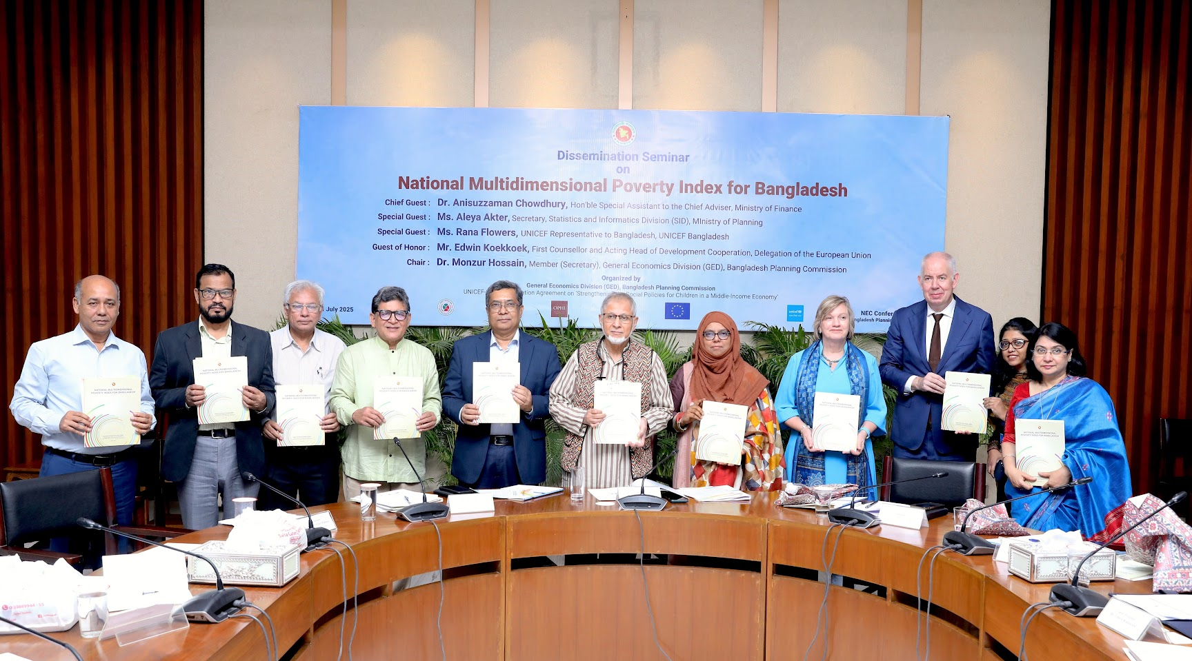 Panel of people holding reports